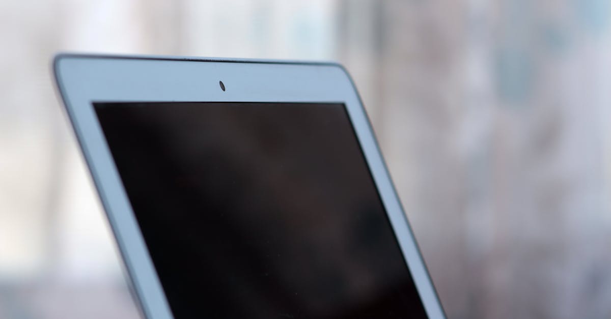 Close-up shot of a tablet with a blank screen, ideal for mockups.